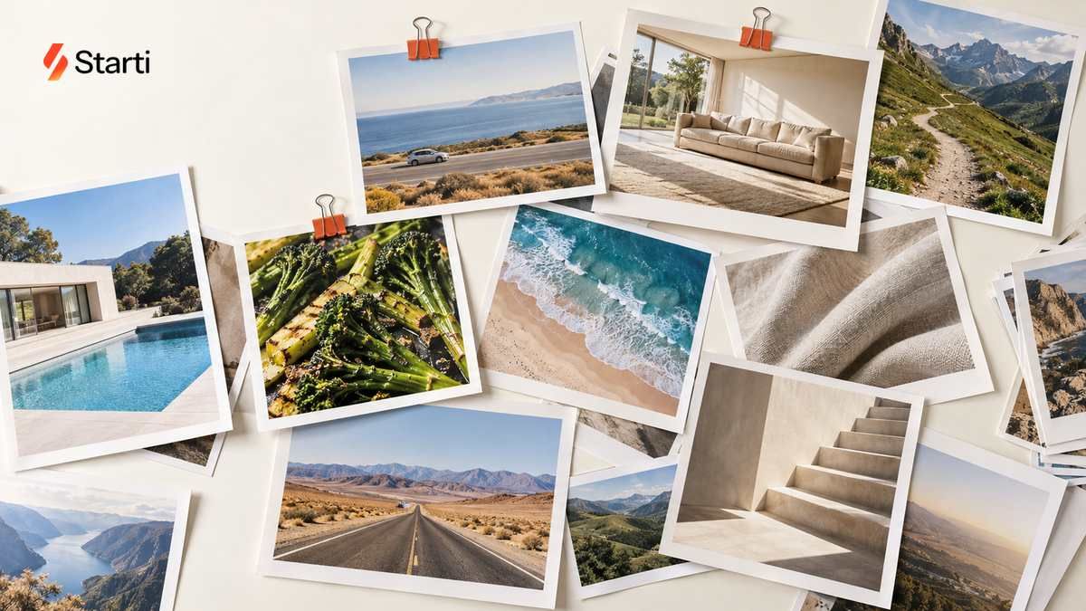 Different printed ad concepts scattered across a pale table, with coral binder clips marking a car on a coastal road, a living room, and a food photograph